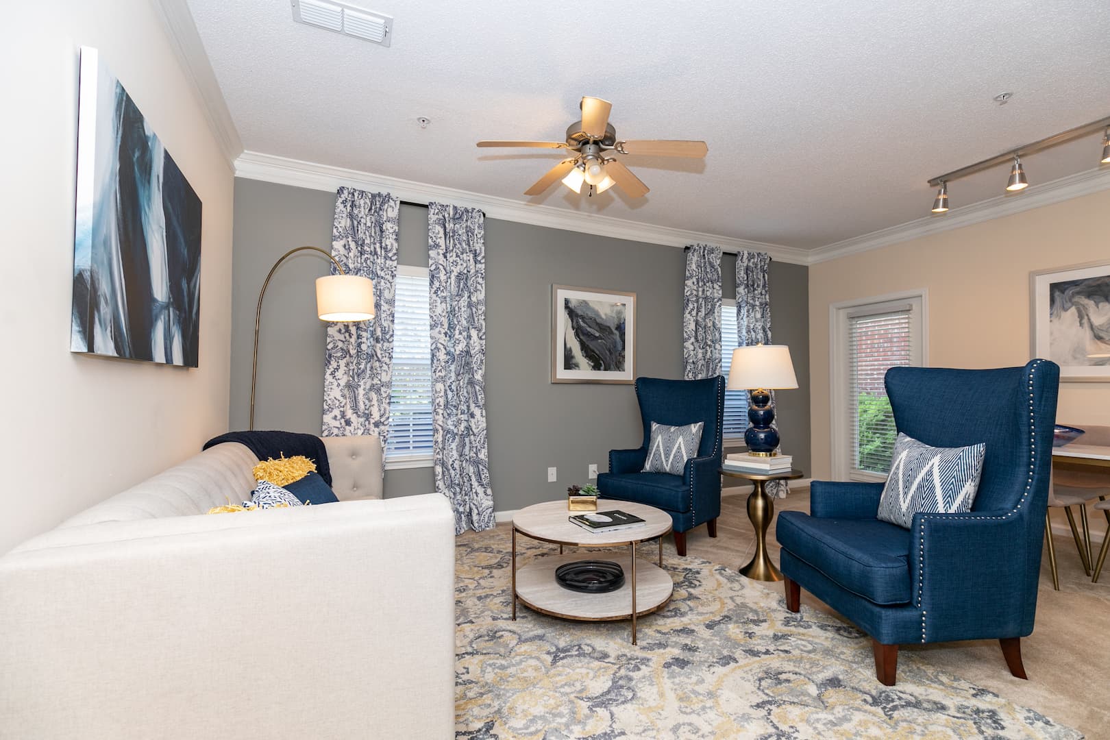 model dining and living rooms leading to patio