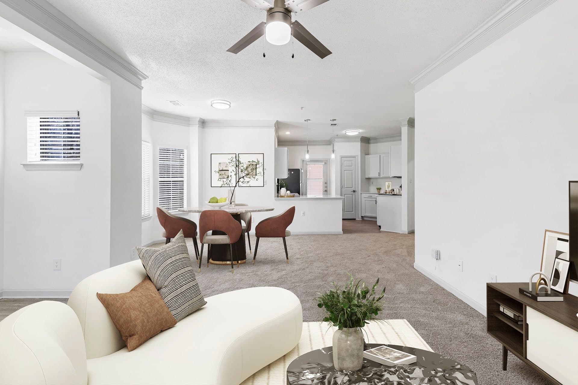 open floor layout with carpeted living and dining rooms